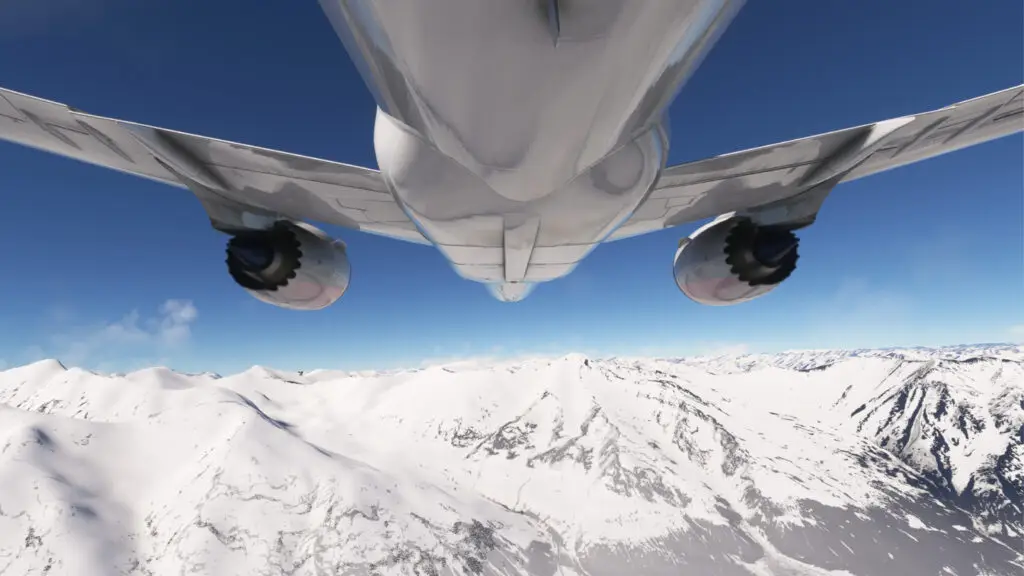 View from directly beneath a Boeing 787 Dreamliner in flight, showcasing the aircraft's underside, sleek wings, and engine nacelles above a snow-covered mountainous landscape.